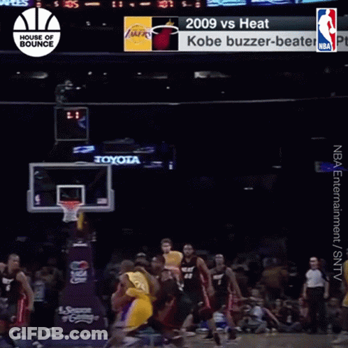 A Basketball Game Between The Heat And The Lakers Is Being Played GIF