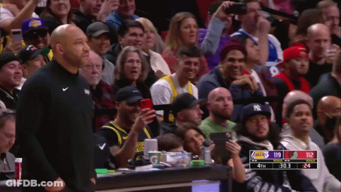 A Basketball Game Between The Lakers And The New York Yankees Is Being Played GIF