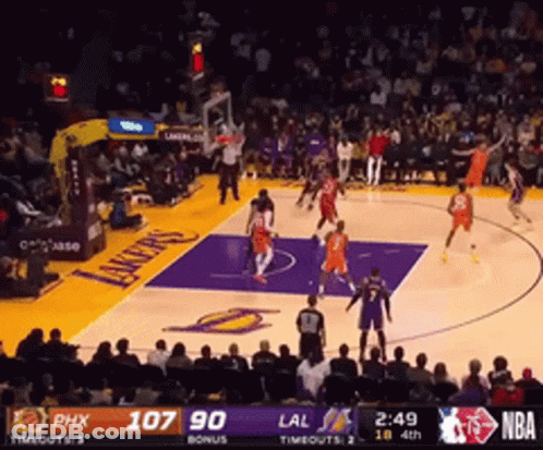 A Basketball Game Between The Lakers And The Suns GIF