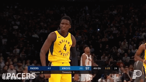 A Basketball Game Between The Pacers And Knicks GIF