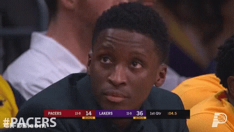 A Basketball Game Between The Pacers And Lakers GIF