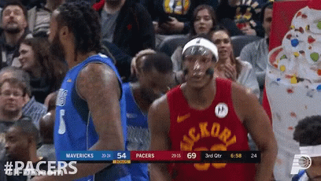 A Basketball Game Between The Pacers And The Mavericks Is Underway GIF