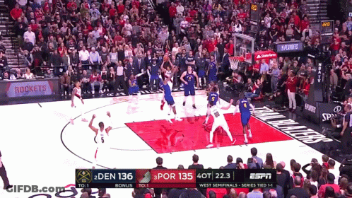 A Basketball Game Between The Rockets And The Blazers GIF