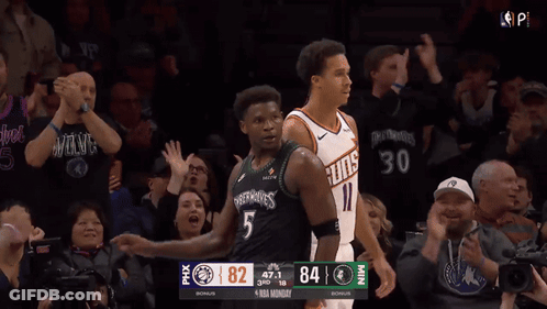 A Basketball Game Between The Suns And The Wolves Is Being Played GIF