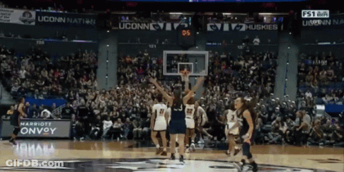 A Basketball Game Between Uconn And The Huskies Is Going On GIF