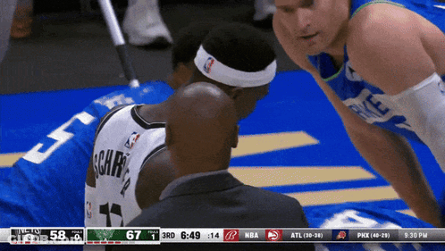 A Basketball Game Is Being Played And The Score Is 58 To 67 GIF