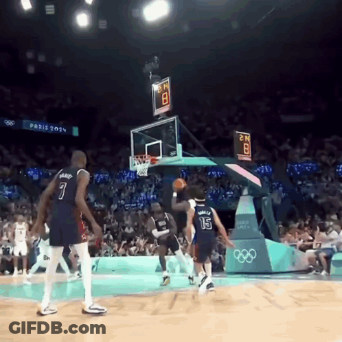 A Basketball Game Is Being Played At The Paris Olympics GIF