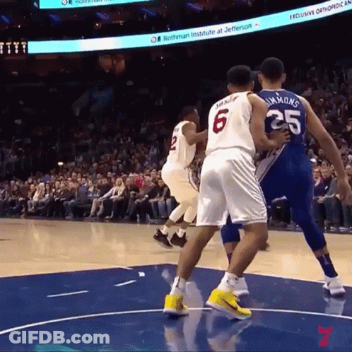 A Basketball Game Is Being Played At The Rothman Institute GIF