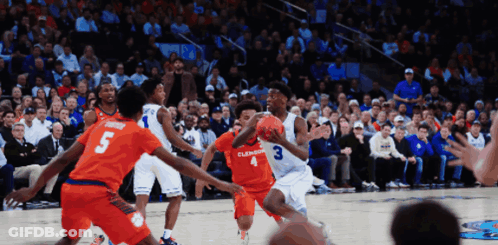 A Basketball Game Is Being Played Between Clemson And Virginia Tech GIF