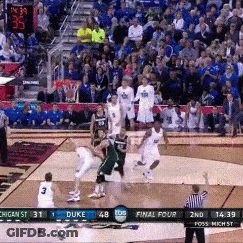 A Basketball Game Is Being Played Between Duke And Michigan State GIF