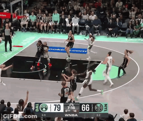 A Basketball Game Is Being Played Between The Dal And Nyl Teams GIF