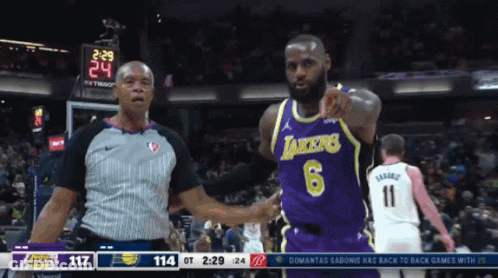 A Basketball Game Is Being Played Between The Lakers And The Pistons GIF