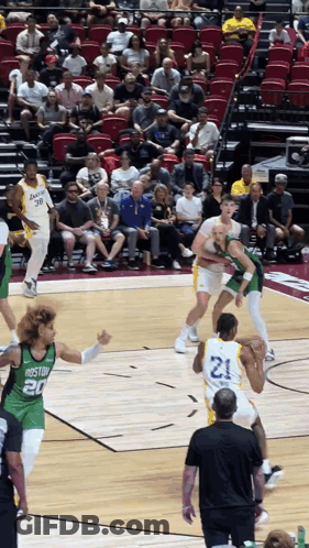 A Basketball Game Is Being Played Between The Los Angeles Lakers And Boston Celtics GIF