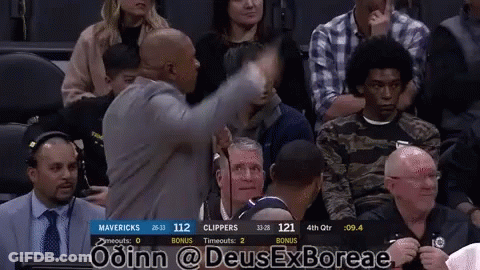 A Basketball Game Is Being Played Between The Mavericks And The Clippers GIF