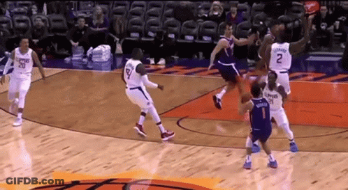 A Basketball Game Is Being Played Between The Memphis Grizzlies And The Phoenix Suns . GIF