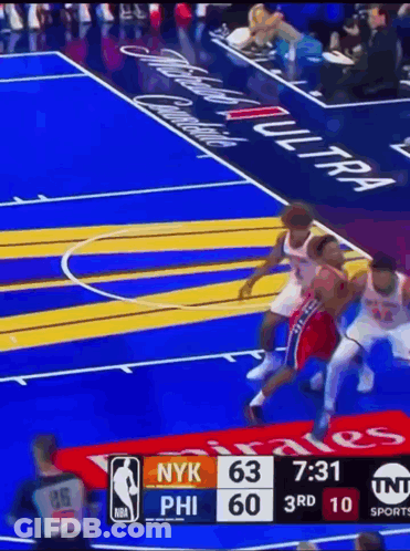 A Basketball Game Is Being Played Between The Nyk And Phi GIF