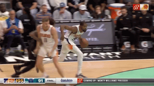 A Basketball Game Is Being Played Between The Suns And The Wizards GIF