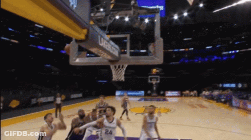 A Basketball Game Is Being Played In A Stadium Sponsored By Urassa GIF