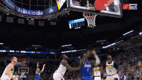 A Basketball Game Is Being Played In A Stadium That Says Aura.com GIF