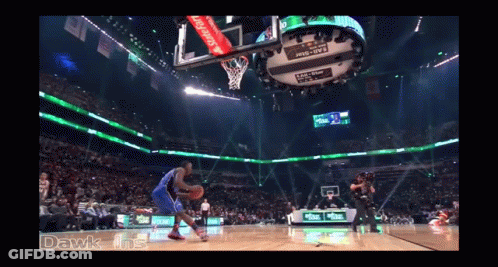 A Basketball Game Is Being Played In A Stadium That Says ' Dawk Ins ' On The Bottom GIF