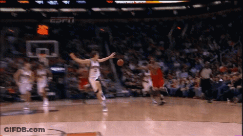 A Basketball Game Is Being Played In A Stadium That Says Espn On It GIF