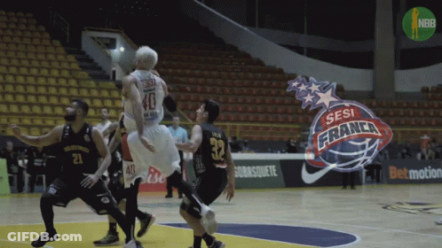 A Basketball Game Is Being Played In A Stadium With A Logo For Sesi France In The Background GIF