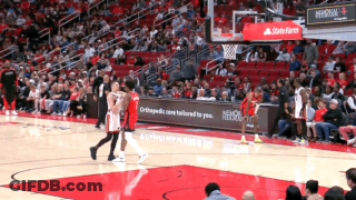 A Basketball Game Is Being Played In A Stadium With A State Farm Ad GIF