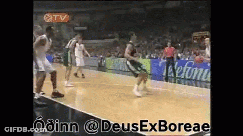 A Basketball Game Is Being Played In A Stadium With Advertisements For Telefoni GIF
