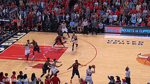 A Basketball Game Is Being Played In A United Center GIF