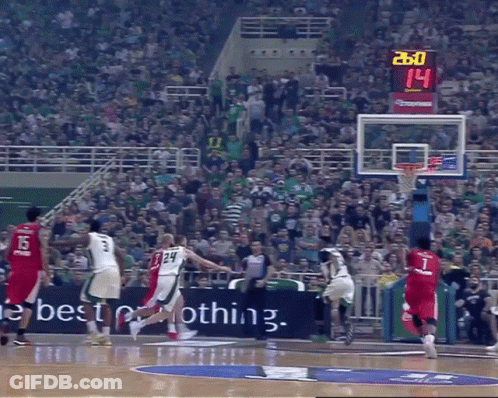 A Basketball Game Is Being Played In Front Of A Banner That Says Best GIF
