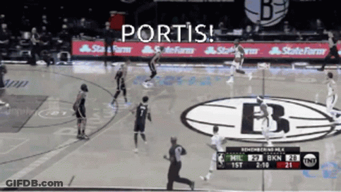 A Basketball Game Is Being Played In Front Of A Banner That Says State Farm GIF