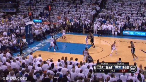 A Basketball Game Is Being Played In Front Of A Crowd And The Score Is 97 To 59 GIF