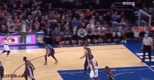 A Basketball Game Is Being Played In Front Of A Crowd And The Word Ming Is On The Bottom Right GIF