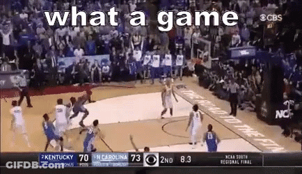 A Basketball Game Is Being Played In Front Of A Crowd And The Words What A Game Are On The Screen . GIF