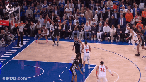 A Basketball Game Is Being Played In Front Of A Crowd At The New York Knicks GIF