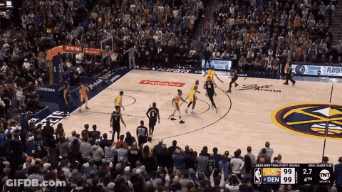 A Basketball Game Is Being Played In Front Of A Crowd Sponsored By Coinbase And Tnt Sports GIF