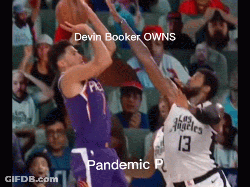 A Basketball Game Is Being Played In Front Of A Crowd With A Caption That Says Devin Booker Owns Pandemic P . GIF