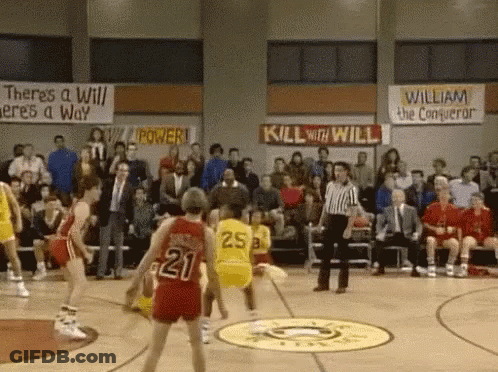 A Basketball Game Is Being Played In Front Of A Crowd With A Sign That Says Kill With Will GIF