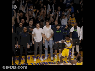 A Basketball Game Is Being Played In Front Of A Crowd With A Tnt Logo GIF