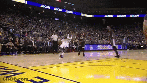 A Basketball Game Is Being Played In Front Of A Crowd With Ads For Dubs On The Sidelines GIF
