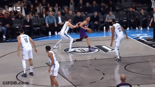 A Basketball Game Is Being Played In Front Of A Crowd With Nba Tnt Written On The Screen GIF