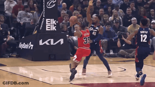 A Basketball Game Is Being Played In Front Of A Keybank Advertisement GIF
