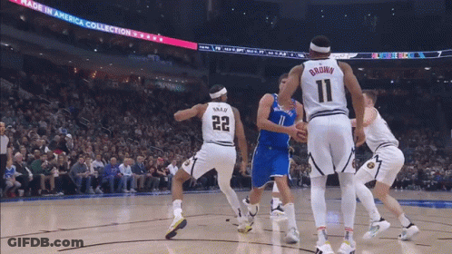 A Basketball Game Is Being Played In Front Of A Made In America Collection Banner GIF