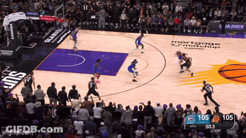 A Basketball Game Is Being Played In Front Of A Mortgage Matchup Center GIF