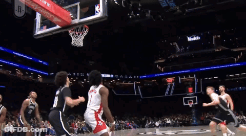 Basketball Game In Front Of Redbull Banner GIF