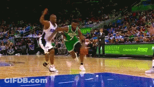 A Basketball Game Is Being Played In Front Of A Sign For Aeropostale GIF