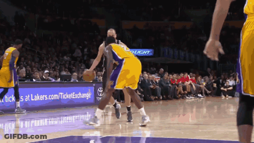 A Basketball Game Is Being Played In Front Of A Sign That Says Bud Light GIF