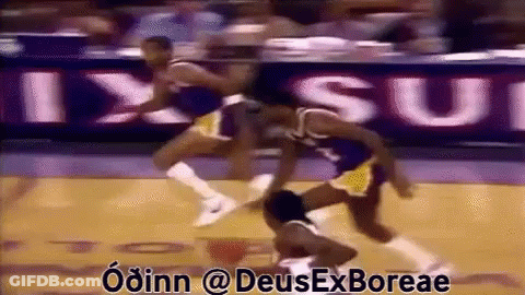 A Basketball Game Is Being Played In Front Of A Sign That Says " Ixsui " GIF