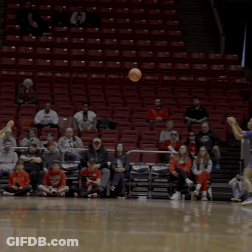 A Basketball Game Is Being Played In Front Of A Sign That Says ' Store ' On It GIF