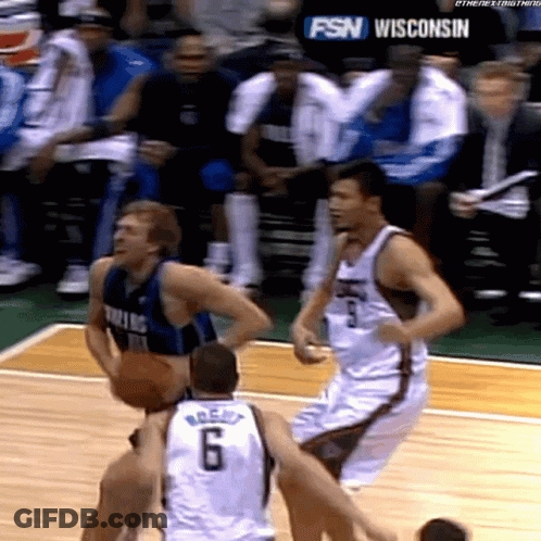 A Basketball Game Is Being Played In Wisconsin With A Fsn Logo In The Background GIF
